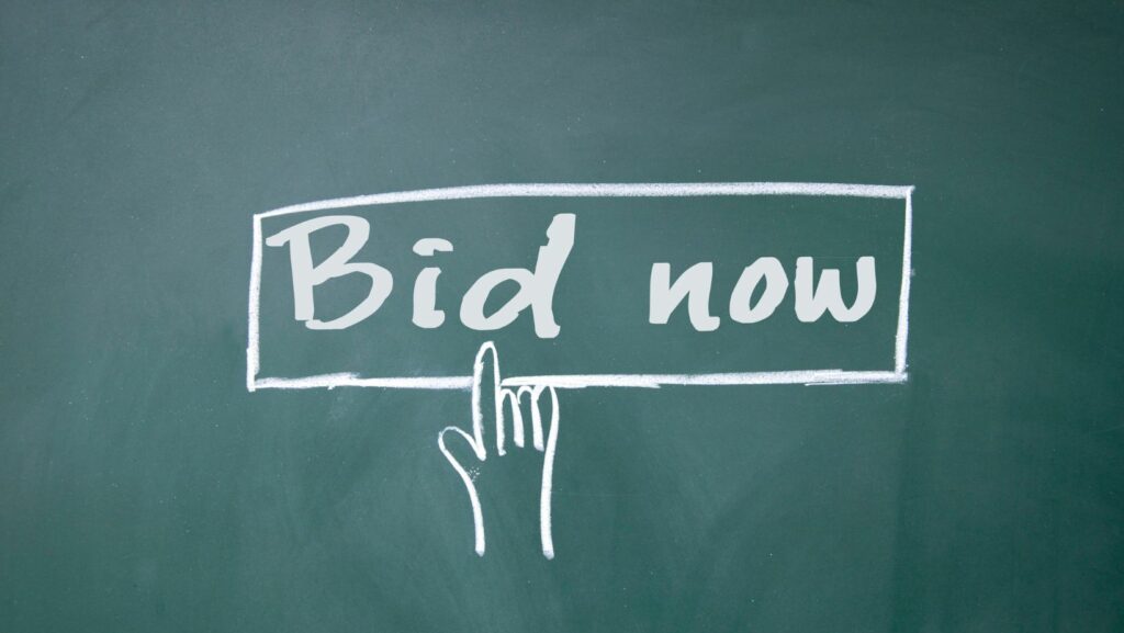 what can automated bidding help an advertiser improve?